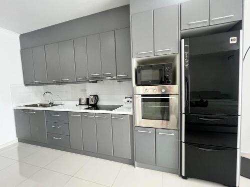 Dapur atau dapur kecil di Viewtalay Beachfront by ND