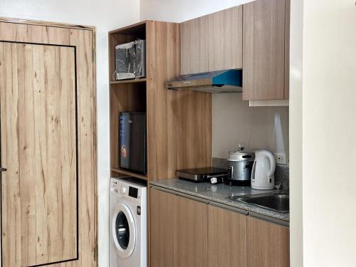 Η κουζίνα ή μικρή κουζίνα στο Inspiria Condo Davao next to Abreeza Ayala Mall