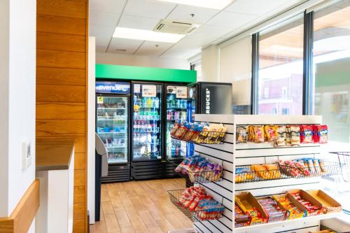 a grocery store with two refrigerators at Holiday Inn Nashville - Vanderbilt - Dwtn by IHG in Nashville