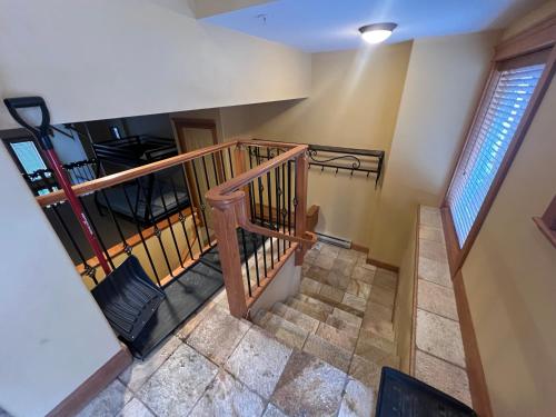 an overhead view of a staircase in a house at Townhouse, Ski in Ski out in Big White