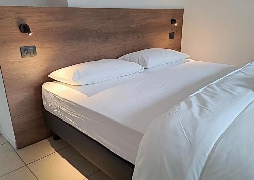 Postel nebo postele na pokoji v ubytování GUEST ROOM GRADONOVE