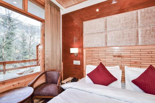 Postel nebo postele na pokoji v ubytování Anand Vilas Retreat By THC Hotels - Manali