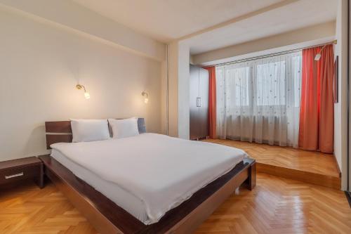 Ένα ή περισσότερα κρεβάτια σε δωμάτιο στο Scala Flat