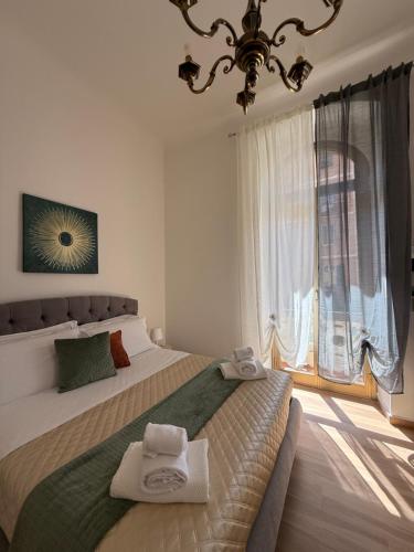 Postel nebo postele na pokoji v ubytování Casa Camilla&Iris