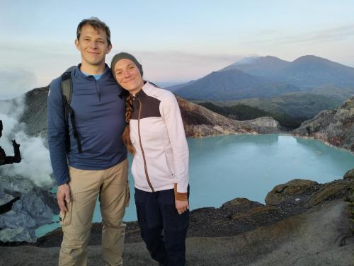 a man and a woman standing on top of a mountain at Nio Homestay and Tour in Licin