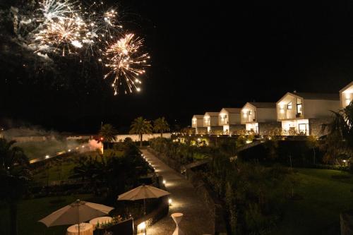 a firework display at a resort at night at Azores Homes Resort & Spa in Ponta Delgada
