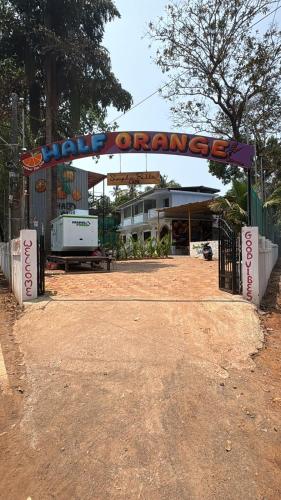 a sign that reads orrance in front of a building at Simple Belle by Half Orangee with Swimming Pool ,Near to Beach -Clubs - Hill Top best for Corporate Bookings-Summer vacation!! in Vagator