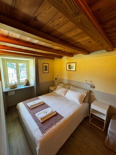 Posteľ alebo postele v izbe v ubytovaní Maison Palmira