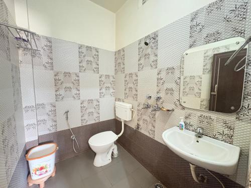 Koupelna v ubytování Hotel Benson Blue In Cuttack