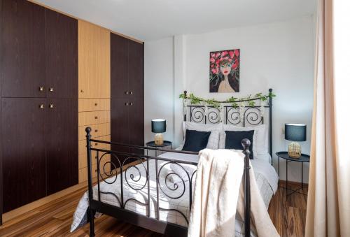 Ένα ή περισσότερα κρεβάτια σε δωμάτιο στο Cocomelo apts 3 luxury