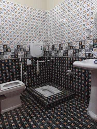 Bilik mandi di Rose Palace Guest House