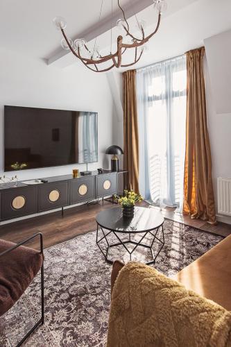 Μια τηλεόραση ή/και κέντρο ψυχαγωγίας στο Loft Gryfita