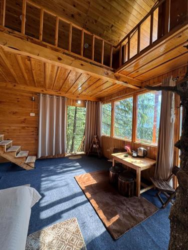 Posezení v ubytování Kakapo Nest a Big Chill Treehouse