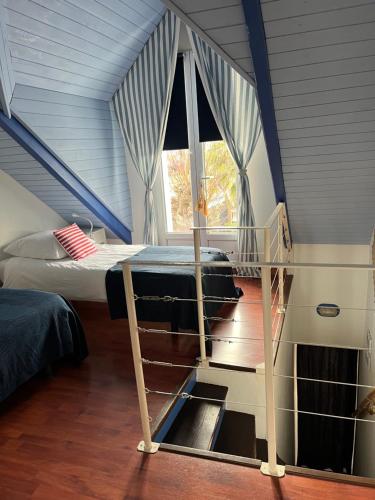 En eller flere senge i et værelse på Charmante maison entre Marché et Tourelles