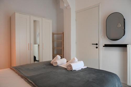 Ένα ή περισσότερα κρεβάτια σε δωμάτιο στο Pola's Cozy Apartment