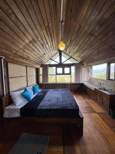 Ένα ή περισσότερα κρεβάτια σε δωμάτιο στο The Wood Top