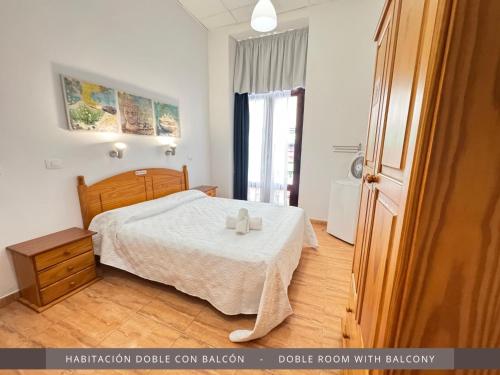 Postel nebo postele na pokoji v ubytování Hotel Kasa