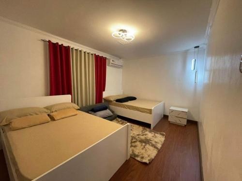 Ένα ή περισσότερα κρεβάτια σε δωμάτιο στο Mango Oasis 2 - Cozy flat house with billiard