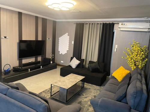 Χώρος καθιστικού στο Mango Oasis 2 - Cozy flat house with billiard