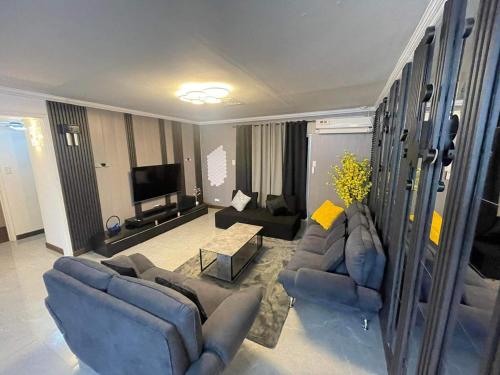 Χώρος καθιστικού στο Mango Oasis 2 - Cozy flat house with billiard