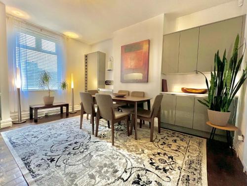 a dining room with a table and chairs at Arnold House in the heart of Calverley village in Calverley