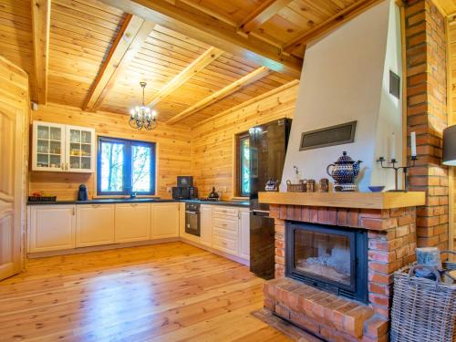 Dapur atau dapur kecil di Ferienhaus "Maga" am See Walpusz- mit gratis Kajak, Kamin & Hunde willkommen