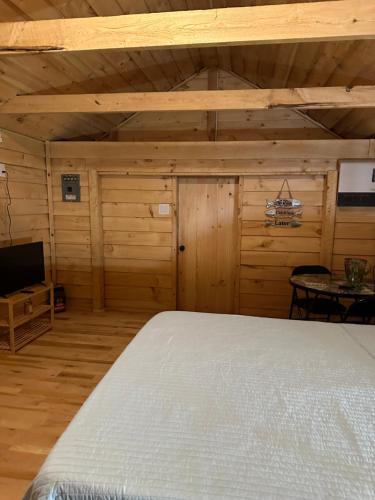Ένα ή περισσότερα κρεβάτια σε δωμάτιο στο GGgs Cabin