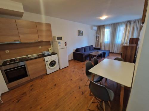 a small apartment with a kitchen and a living room at MitProt Panorama Bay 2 Apartment 74 in Sveti Vlas