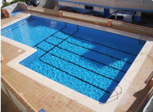Bazén v ubytování Estudio cerca de la playa nebo v jeho okolí
