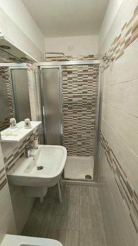 Um banheiro em Hotel Blanchetti