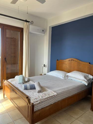 A bed or beds in a room at Aletraki -Off-Grid Retreat Above Heraklion, Peaceful Views