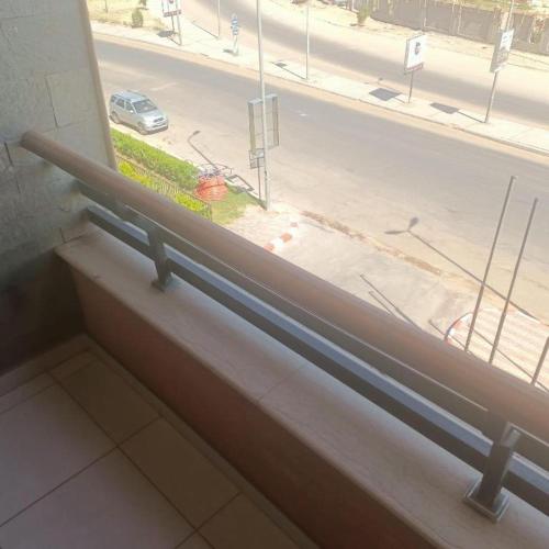 a window in a building with a view of a street at Gloria Aqua Park Hotel in Aswan