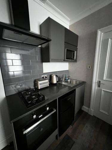 Foto Amani Apartments - Glasgow City Centre 6