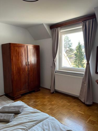 Postel nebo postele na pokoji v ubytování Oaza Narave