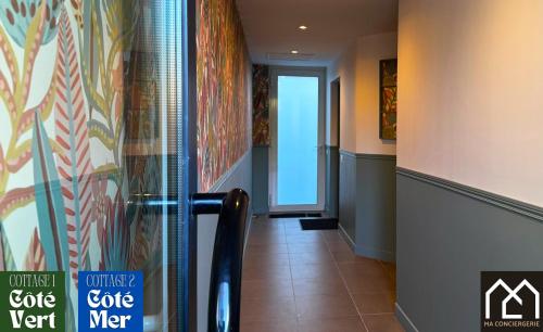 a hallway with a door leading into a building at Les Inattendus - Cottages Premium, Proche Mer avec Parking privé in Boulogne-sur-Mer