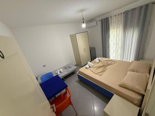 Postel nebo postele na pokoji v ubytování Namelijan's Hotel