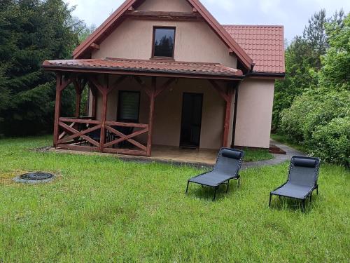 Mazury, Domek pod Lasemにある庭