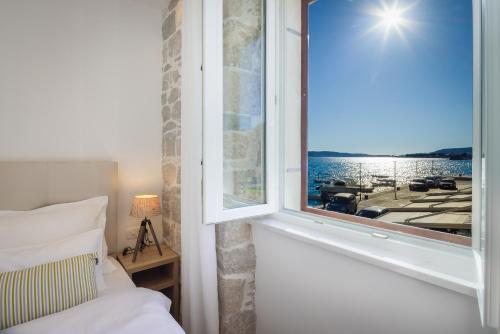 Ένα ή περισσότερα κρεβάτια σε δωμάτιο στο Meridiem Apartment