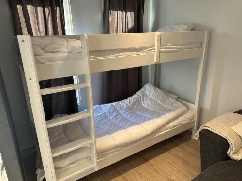 Una cama o camas en una habitación de Nasma