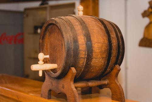 a wooden barrel sitting on top of a table at Apartments Lovrić in Vodice