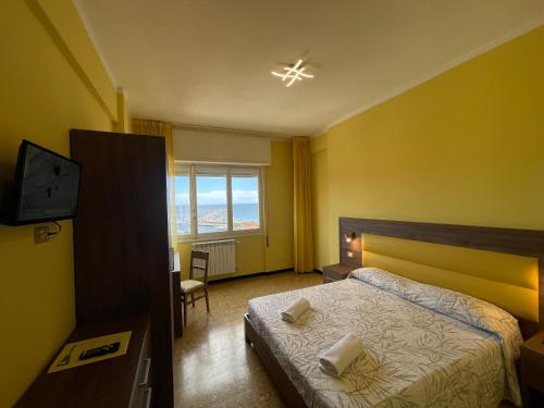 Postel nebo postele na pokoji v ubytování Hotel Robinia