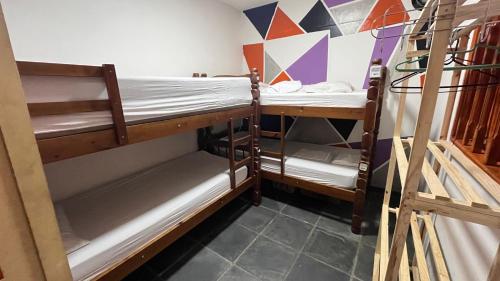 a couple of bunk beds in a room at COACHHOSTEL7 in Sao Paulo