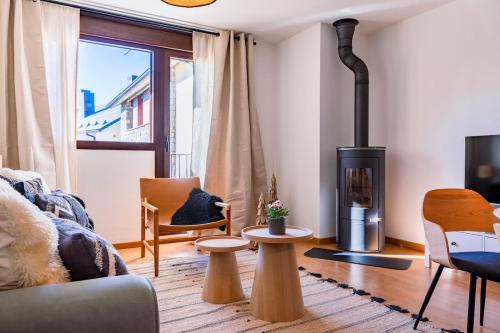 Χώρος καθιστικού στο El Nido del Pirineo Estilo y Calidez en Villanúa