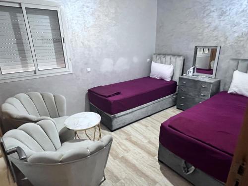Postel nebo postele na pokoji v ubytování Beachfront apartment