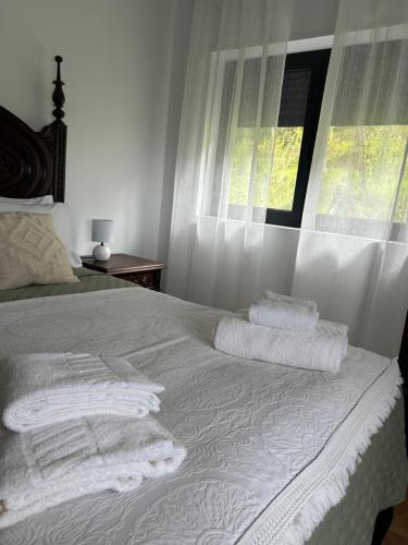 Ein Bett oder Betten in einem Zimmer der Unterkunft Casa de Fráguas