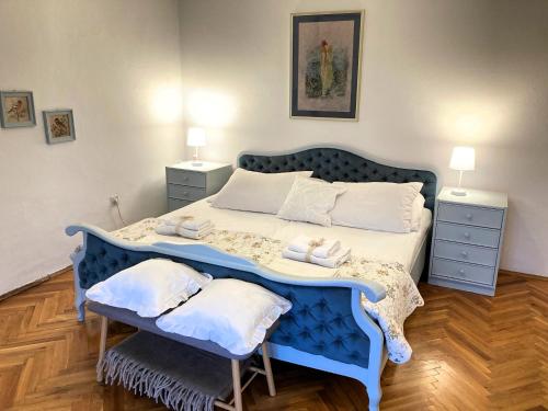 Postel nebo postele na pokoji v ubytování Apartman Feješ