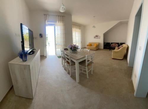 TV a/nebo společenská místnost v ubytování Casa vacanze Salento Sant Isidoro