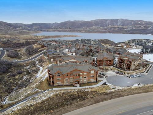 an aerial view of a resort with a lake at Ideal Condo 2 Minute Drive to Deer Valley's Lift in Heber City