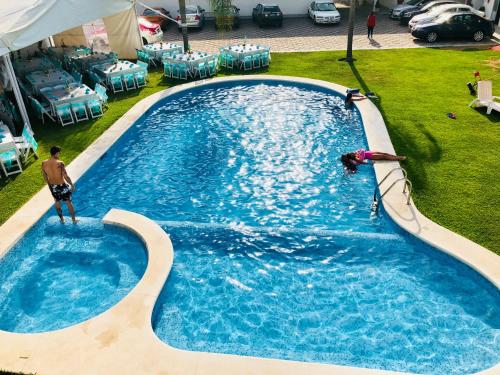 Πισίνα στο ή κοντά στο Hotel Palmas Cocoyoc