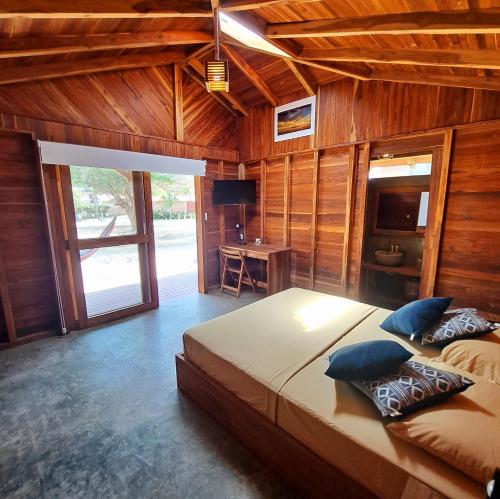 Cama o camas de una habitación en Cabañas La Tortuga